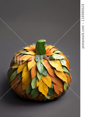 The shape of the pumpkin is created from colorful autumn leaves. Studio photo on a gray background. The concept of a symbolic autumn plant: a vegetable, fruit, or berry thanks to its leaves The shape of the pumpkin is created from colorful autumn leaves. Studio photo on a gray background. The concept of a symbolic autumn plant: a vegetable, fruit, or berry thanks to its leaves 118980028