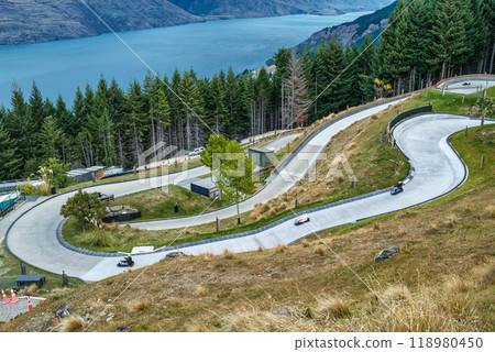Group of tourist enjoying and riding skyline queenstown luge is the most famous activity Group of tourist enjoying and riding skyline queenstown luge is the most famous activity 118980450