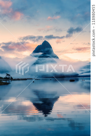 Milford Sound with Mitre peak in foggy on the lake during the morning at New Zealand 118980455