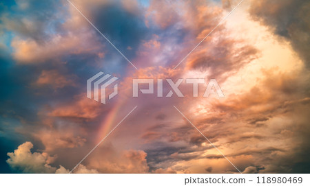 Dramatic sky with cloud and rainbow in the sunset 118980469