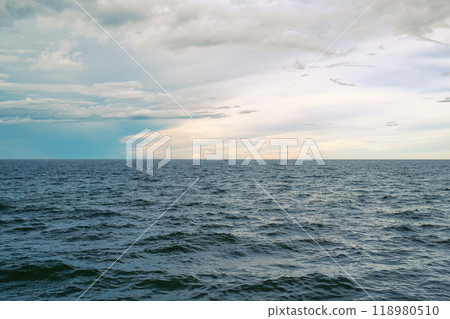 Tropical sea with deep blue wave and small fishing boat 118980510