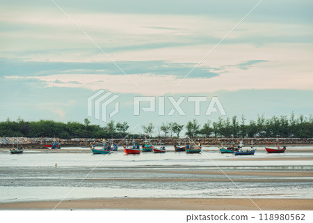 Traditional fishing boat moored on the beach in tropical sea Traditional fishing boat moored on the beach in tropical sea 118980562