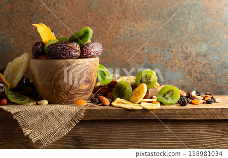 Dried tropical fruits with various nuts and raisins. 118981034