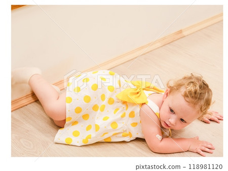 Beautiful blonde baby girl playing in kindergarten Beautiful blonde baby girl playing in kindergarten 118981120