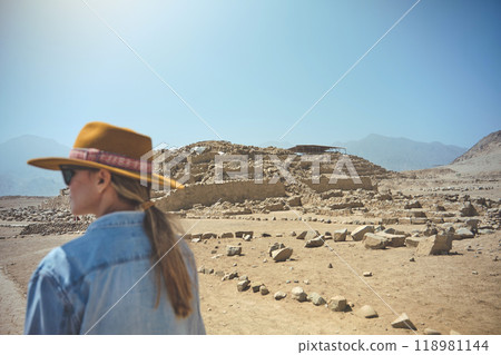 Young Latin woman in archaeological site of the Sacred City of Caral, Peru. 118981144