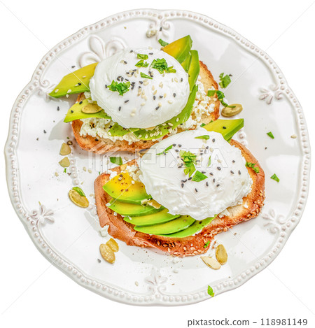 Two toasts for breakfast, a poached egg with avocado on a plate isolated on white background. top view, clipping path Two toasts for breakfast, a poached egg with avocado on a plate isolated on white background. top view, clipping path 118981149