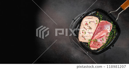 Raw duck breast in pan. Long banner format. top view. copy space for text Raw duck breast in pan. Long banner format. top view. copy space for text 118981207