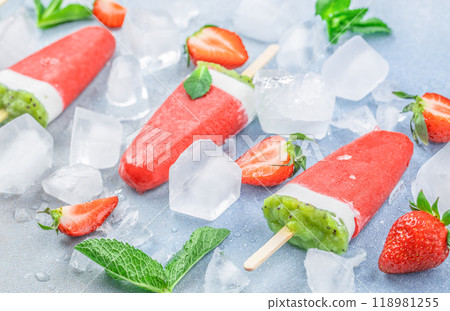 Homemade popsicles strawberry and kiwi ice cream in shape of watermelon Homemade popsicles strawberry and kiwi ice cream in shape of watermelon 118981255