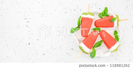Strawberry ice cream popsicles in a bowl with ice on a white background, Vegan diet food concept 118981262