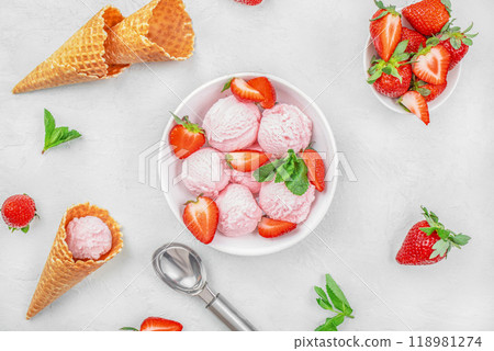 ice cream balls with waffles. Bowl of pink strawberry ice cream scoop. summer concept 118981274