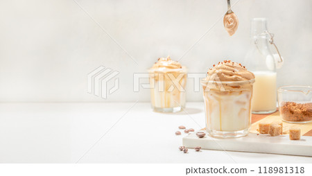 Iced Dalgona Coffee, fluffy creamy whipped coffee. Korean coffee. Long banner format. copy space for text 118981318