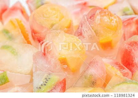 fresh berries in ice cubes fruit ice background 118981324