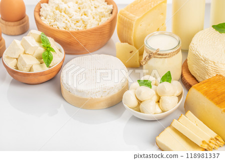 Dairy products, Bottle milk, cheeses, cottage cheese, eggs, yogurt, butter on white background Dairy products, Bottle milk, cheeses, cottage cheese, eggs, yogurt, butter on white background 118981337