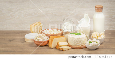 Different types of fresh farm dairy products on a wooden table. eco lactose-free dairy products concept 118981442
