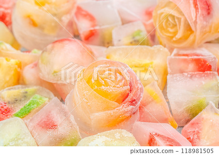 ice cubes with fresh fruits and berries. Summer background ice cubes with fresh fruits and berries. Summer background 118981505