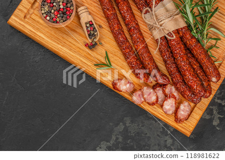 Thin dry kabanosy sausages. Smoked homemade sausage Thin dry kabanosy sausages. Smoked homemade sausage 118981622