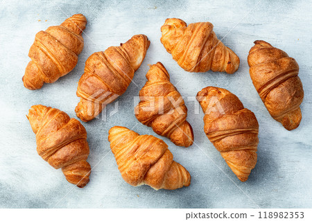 Group of sweet croissant . French morning breakfast . Top view 118982353