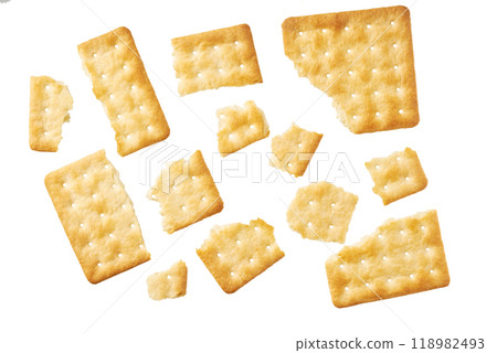 Broken square water crackers isolated on white background, top view. 118982493