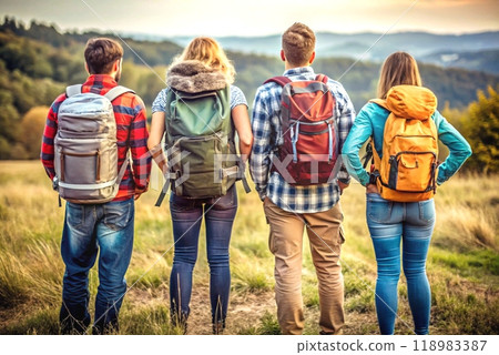 Four young tourists with backpacks survey the further path 118983387