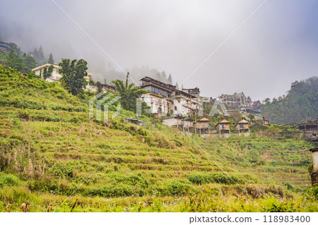 Rice terraces in the fog in Sapa, Vietnam. Rice fields prepare the harvest at Northwest Vietnam. Vietnam opens to tourism after quarantine Coronovirus COVID 19 Rice terraces in the fog in Sapa, Vietnam. Rice fields prepare the harvest at Northwest Vietnam. Vietnam opens to tourism after quarantine Coronovirus COVID 19 118983400