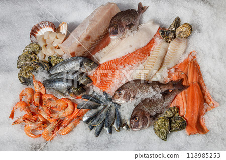 An Exquisite Assorted Fresh Seafood Collection Beautifully Presented on Ice for Enjoyment An Exquisite Assorted Fresh Seafood Collection Beautifully Presented on Ice for Enjoyment 118985253