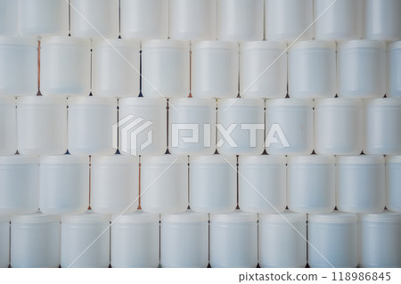 A huge amount of plastic food jars. Excessive consumption of plastic. Reduce, reuse, recycle 118986845