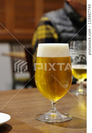 Beer poured into a glass 118987749