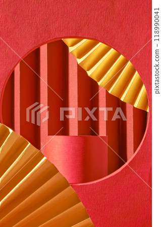 A single red paper sheet is placed on a red background with empty space to display the product. The paper is curled in a loose, organic shape, creating a sense of movement and flow 118990041