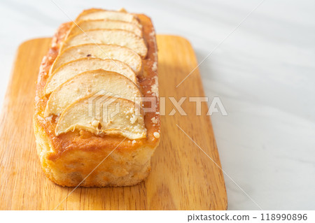 apple loaf crumbled on wood board apple loaf crumbled on wood board 118990896