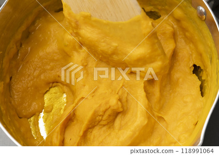 Pumpkin potage: Add milk and consommé to the pumpkin Pumpkin potage: Add milk and consommé to the pumpkin 118991064