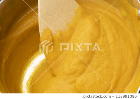 Pumpkin potage: Add milk and consommé to the pumpkin 118991080