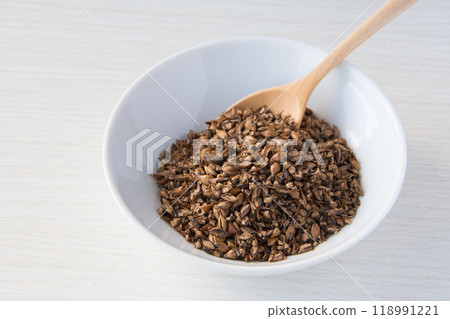 Barley tea served on a white plate Barley tea served on a white plate 118991221