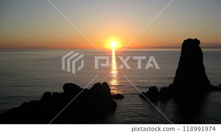 Sunset over the Sea of Japan, strange rock formations and Sado Island Sunset over the Sea of Japan, strange rock formations and Sado Island 118991974