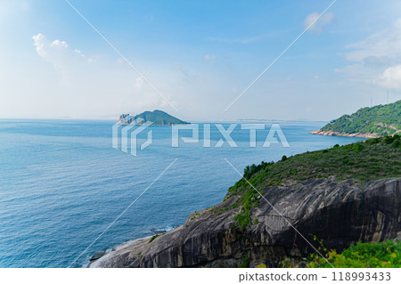 A small island next to the mainland. A small island next to the mainland. 118993433