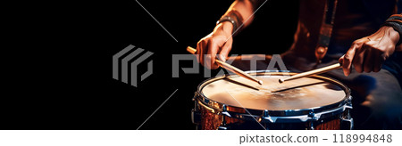 Drummer with Wooden Drumsticks while performing a Roll on a Snare Drum - Generative Ai Drummer with Wooden Drumsticks while performing a Roll on a Snare Drum - Generative Ai 118994848