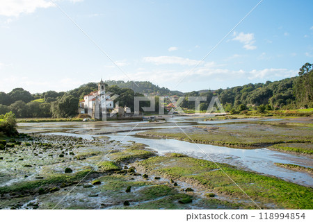 Church of Nuestra Senora de los Dolores and its cemetery during low tide. Niembro, Barro, Llanes, Spain 118994854