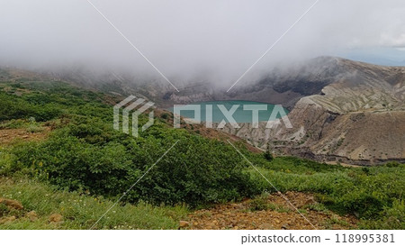 Zao, Okama peeking out from the clouds [Miyagi Prefecture, Japan] 118995381