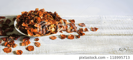 Dry rose petals in a bowl Dry rose petals in a bowl 118995713