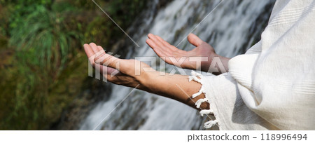 Man praying at the river Man praying at the river 118996494