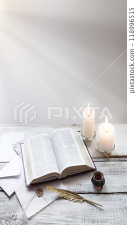 Bible on white wooden table 118996515