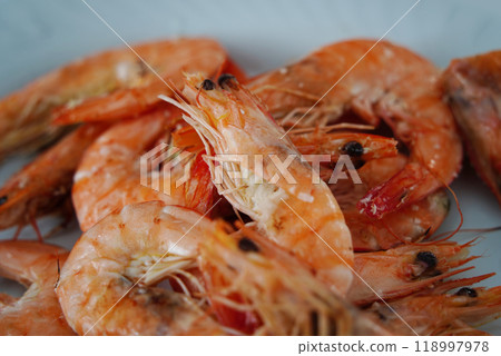 Boiled shrimps on a plate. Close-up. Boiled shrimps on a plate. Close-up. 118997978