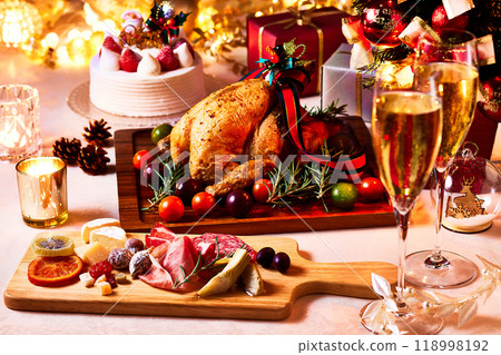 Christmas, Christmas party, chicken on table, hors d'oeuvres and champagne Christmas, Christmas party, chicken on table, hors d'oeuvres and champagne 118998192