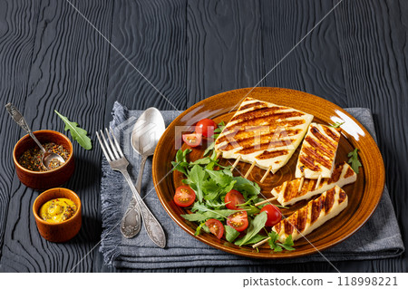 Grilled Greek Halloumi Cheese on sticks, top view 118998221