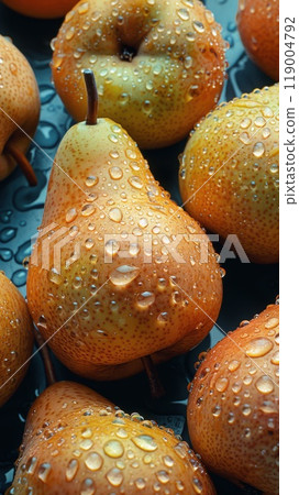 Close-up of fresh pears with water droplets on orange-yellow skin, reflecting ripeness and juicy freshness. Great for autumn, organic food themes, and healthy diet visuals Close-up of fresh pears with water droplets on orange-yellow skin, reflecting ripeness and juicy freshness. Great for autumn, organic food themes, and healthy diet visuals 119004792