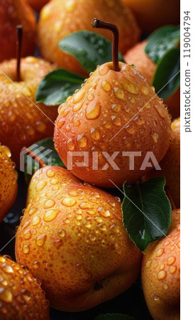 Close-up of fresh, ripe pears with water droplets. The perfect representation of freshness and nature's bounty for food or seasonal designs 119004794