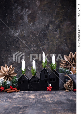 Procass of decorating Christmas advent candles Procass of decorating Christmas advent candles 119007323