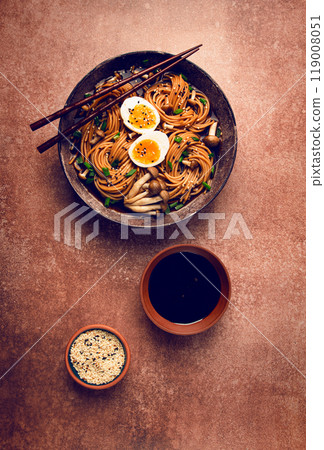 buckwheat noodles, soba, with shimeji mushrooms, boiled egg, green onion, sesame seeds, homemade, no people, 119008051