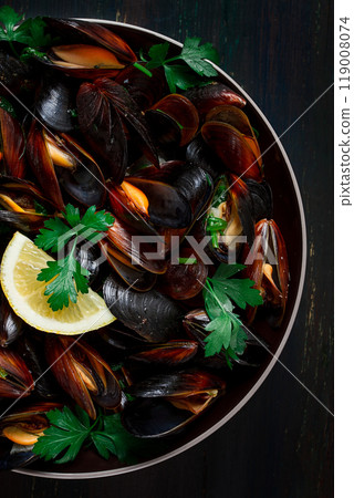 Fresh, Boiled mussels, Black Sea, with parsley and lemon, no people, top view Fresh, Boiled mussels, Black Sea, with parsley and lemon, no people, top view 119008074