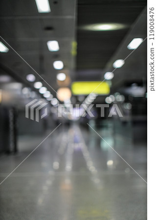 abstract blur of corridor or walkway to departure gate in modern Transportation hub. 119008476