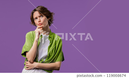 Thinking around stylish woman on violet background. Puzzled lady looking answer. Copy space. Thinking around stylish woman on violet background. Puzzled lady looking answer. Copy space. 119008674